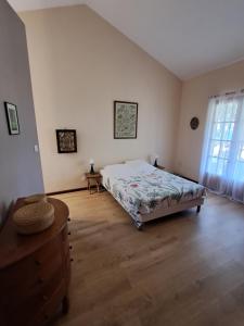 Postel nebo postele na pokoji v ubytování Maison de charme à Manapany + 14 fotografií