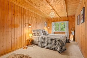 Postel nebo postele na pokoji v ubytování A&Y Chalet Davos Central