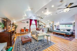 a living room with a couch and a table at 5 Mi to Dtwn Tacoma Modern Studio Retreat in Tacoma