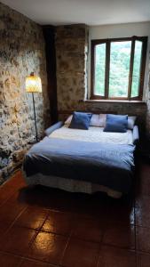 เตียงในห้องที่ Apartamentos La Soleyera +22 ภาพ