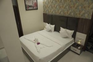 Postel nebo postele na pokoji v ubytování Hotel Decent