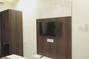 TV a/nebo společenská místnost v ubytování Hotel Decent