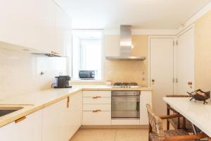 Η κουζίνα ή μικρή κουζίνα στο GuestReady - Contemporary Flat w/ Garage in Lisbon