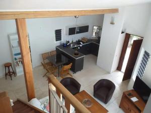 an overhead view of a living room with a desk at Maison charmante à Saint-Siffret + Piscine in Saint-Siffret