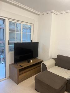 TV a/nebo společenská místnost v ubytování Al borde del mar