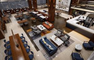 an overhead view of a restaurant with blue chairs and tables at Crowne Plaza Istanbul - West in Istanbul