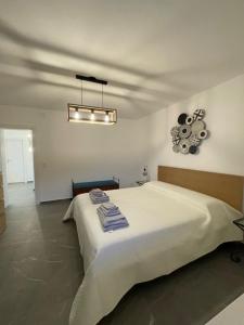 Ένα ή περισσότερα κρεβάτια σε δωμάτιο στο Casa Oasi Brusino