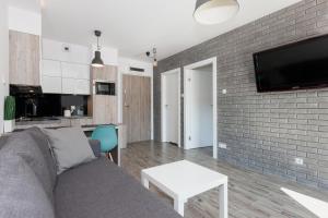 Kuchyňa alebo kuchynka v ubytovaní Apartament Szczęśliwa Dziewiątka