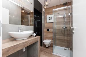 Kúpeľňa v ubytovaní Apartament Szczęśliwa Dziewiątka + 6 fotografií