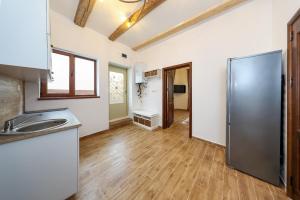 Η κουζίνα ή μικρή κουζίνα στο Casa Schei +2 φωτογραφίες