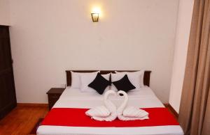 Ένα ή περισσότερα κρεβάτια σε δωμάτιο στο The Serene Hideaway +5 φωτογραφίες