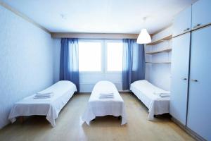 Ένα ή περισσότερα κρεβάτια σε δωμάτιο στο Spacious Apartment for 5