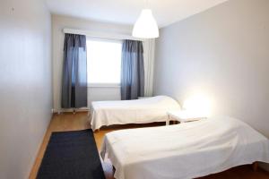Ένα ή περισσότερα κρεβάτια σε δωμάτιο στο Spacious Apartment for 5