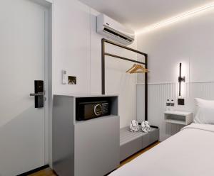 Ένα ή περισσότερα κρεβάτια σε δωμάτιο στο Casa Guogu by AmazINN Places 2f