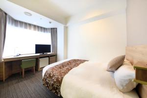 TV a/nebo společenská místnost v ubytování Hotel Sunshine Utsunomiya