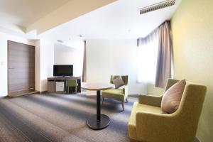 TV a/nebo společenská místnost v ubytování Hotel Sunshine Utsunomiya