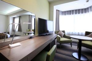 TV a/nebo společenská místnost v ubytování Hotel Sunshine Utsunomiya