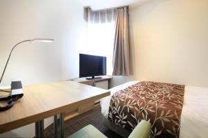TV a/nebo společenská místnost v ubytování Hotel Sunshine Utsunomiya
