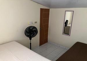 Ένα ή περισσότερα κρεβάτια σε δωμάτιο στο Casa grande em Bonito-PE