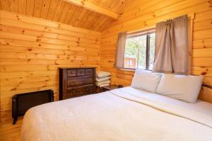 Postel nebo postele na pokoji v ubytování Wilderness Presidential Resort + 49 fotografií