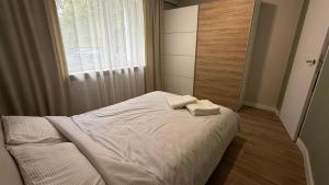 Postel nebo postele na pokoji v ubytování Apartaments Rocha 159 - Blisko Jasnej Góry