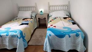 En eller flere senge i et værelse på Casa Rural Asento + 5 billeder