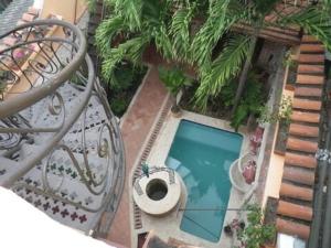 an overhead view of a swimming pool on a balcony at Colonial Luxury Oasis In Cartagena's Old City in Cartagena de Indias