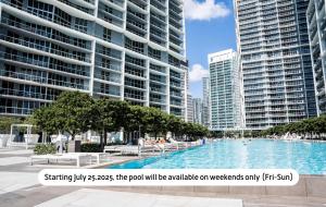a swimming pool in a city with tall buildings at MVR - Direct Bay View - Corner Smart TV in Miami