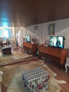 Μια τηλεόραση ή/και κέντρο ψυχαγωγίας στο Loft dentro do Palácio Quitandinha