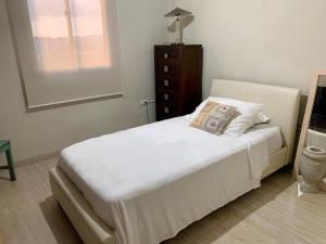 Ένα ή περισσότερα κρεβάτια σε δωμάτιο στο Beautiful apartment Strategic location