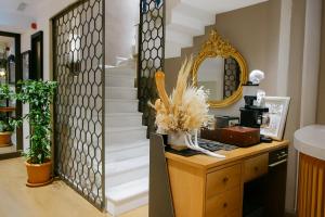 a bathroom with a mirror and a stairway at Aleksandr Pera Hotel in Istanbul +57 photos