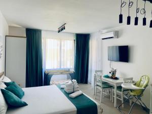Ένα ή περισσότερα κρεβάτια σε δωμάτιο στο BAMBOO BEACH STUDIO- Sozopol