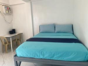 Postel nebo postele na pokoji v ubytování Studio room with AC and kitchenette in the center