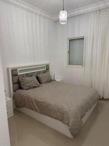 Кровать или кровати в номере Asilah Marina Golf