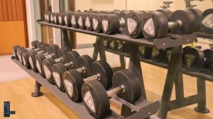 a row of dumbbells in a gym at Loft2600 in Baguio