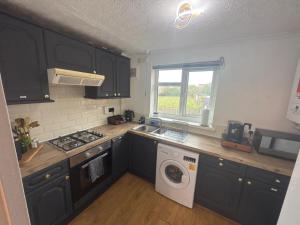 Kuchyň nebo kuchyňský kout v ubytování Luxury 2 Bedroom Apartment