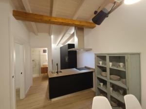 a kitchen with a sink and a counter top at El Paraíso de Aitana in Ramales de la Victoria