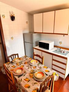 Кухня или мини-кухня в Casa Stella
