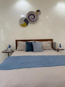 Ένα ή περισσότερα κρεβάτια σε δωμάτιο στο Cozy Beach Apartment in Ngor
