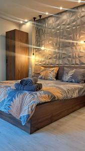 En eller flere senge i et værelse på Къща за гости Рилски чардак