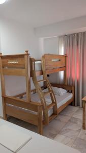 a pair of bunk beds in a room at Vila Kastriotet-Hotel in Lezhë +105 photos