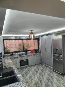 Η κουζίνα ή μικρή κουζίνα στο Villa entière