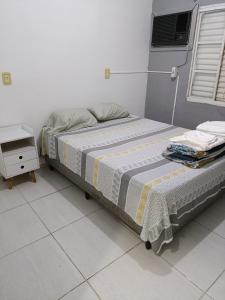 Katil atau katil-katil dalam bilik di Casa com piscina
