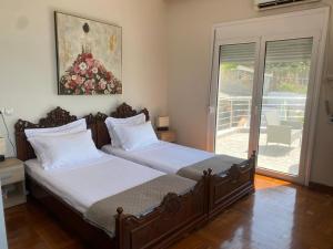 Ένα ή περισσότερα κρεβάτια σε δωμάτιο στο Villa Beta Sea View With Pool +51 φωτογραφίες