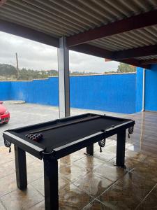 Stolní tenis v ubytování Espaço tá moiado nebo okolí + 4 fotografie