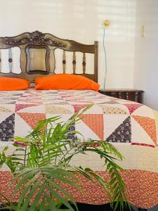 Ένα ή περισσότερα κρεβάτια σε δωμάτιο στο El Atardecer