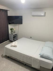 Postel nebo postele na pokoji v ubytování Habitación independiente cerca al aeropuerto 2 + 11 fotografií