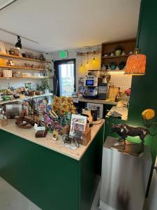 a kitchen with a counter with lots of items on it at Space in Blackstone in Seoul