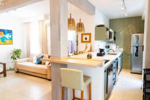 Kuchyň nebo kuchyňský kout v ubytování Condomínio Edificio Miramar