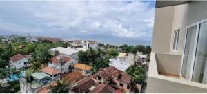 a view of a city from a building at Ocean breeze residencies by NB one bedroom apartment in Negombo